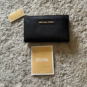 Michael Kors Black Leather Wallet with Gold Accents